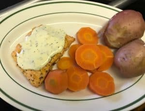 Baked salmon with carrots and potatoes, a weekly dinner entrée at Gavin's