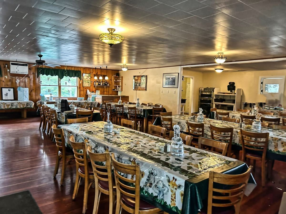 The all-inclusive dining room at Gavin's Irish Country Inn with tables set for dinner