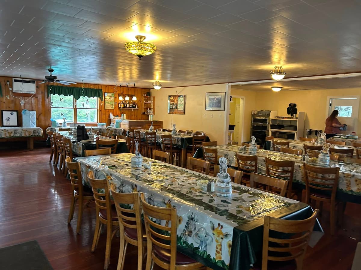 The Gavin's dining room set with long tables for a group celebration
