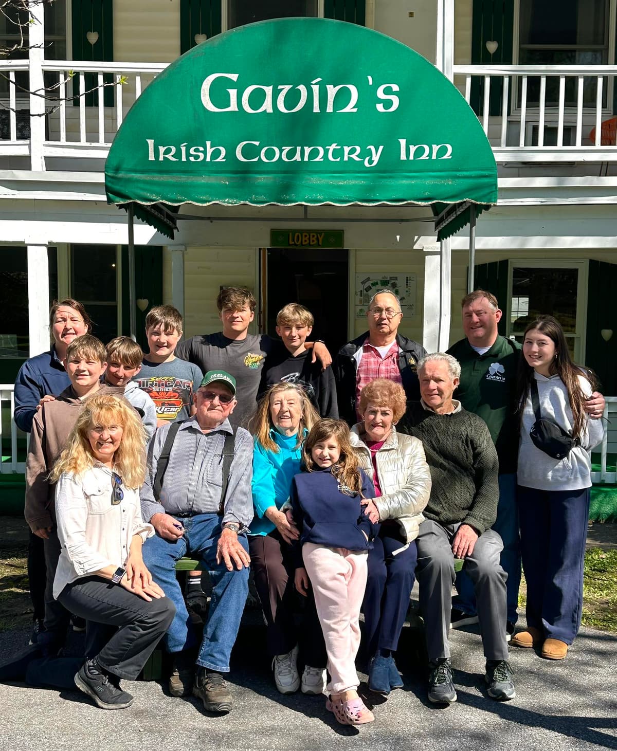 A family gathered under the green awning at Gavin's for Mother's Day weekend 2025