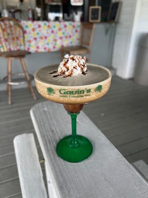 A frozen drink in a Gavin's logo glass at the Pool Bar