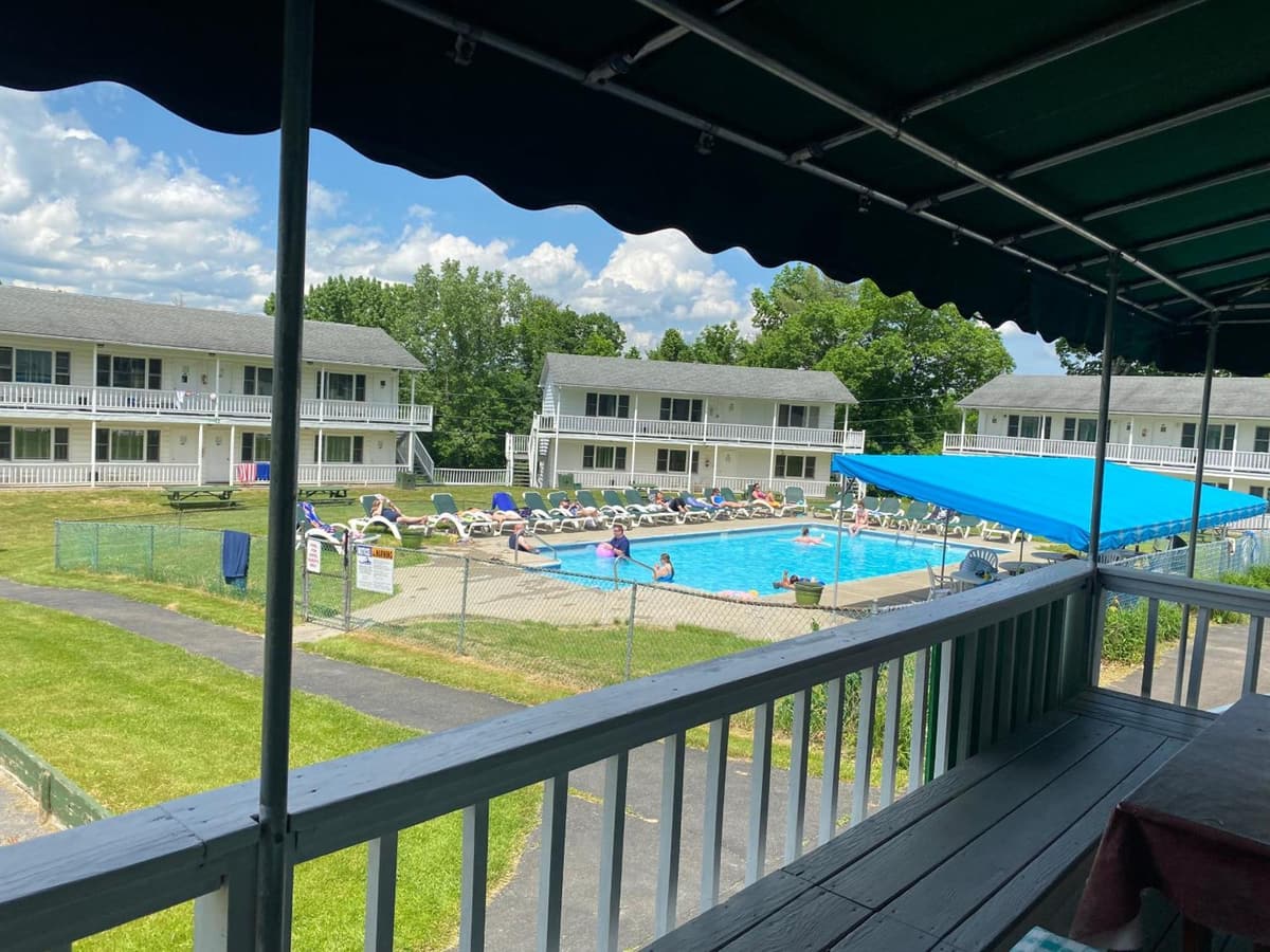 View of the pool and guest wings from a balcony at Gavin's Irish Country Inn