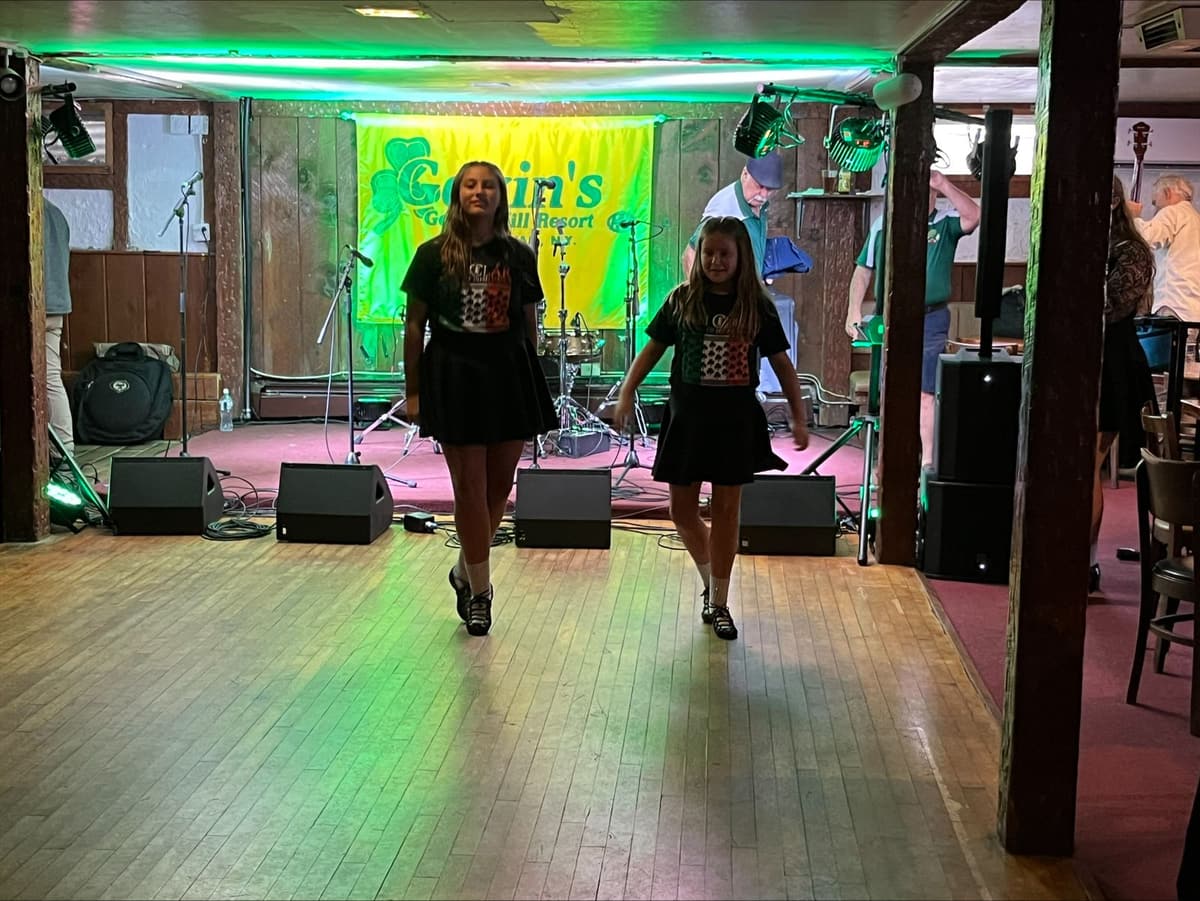 Irish step dancers performing on the dance floor in Gavin's Pub